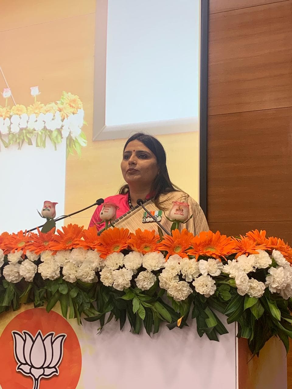 Leader delivering a speech on stage